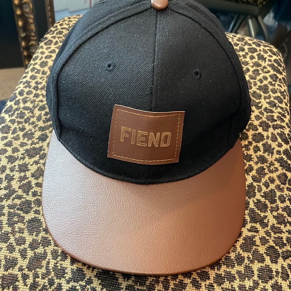 FIEND leather visor cap with metal cam buckle closure